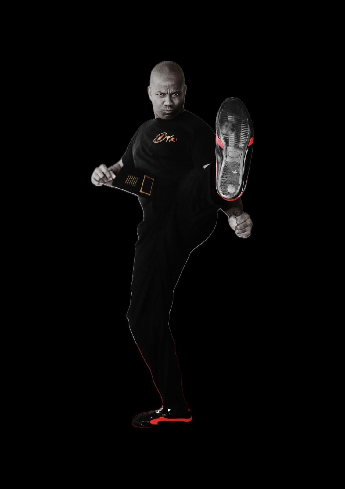 Brian Nelson performing a side kick